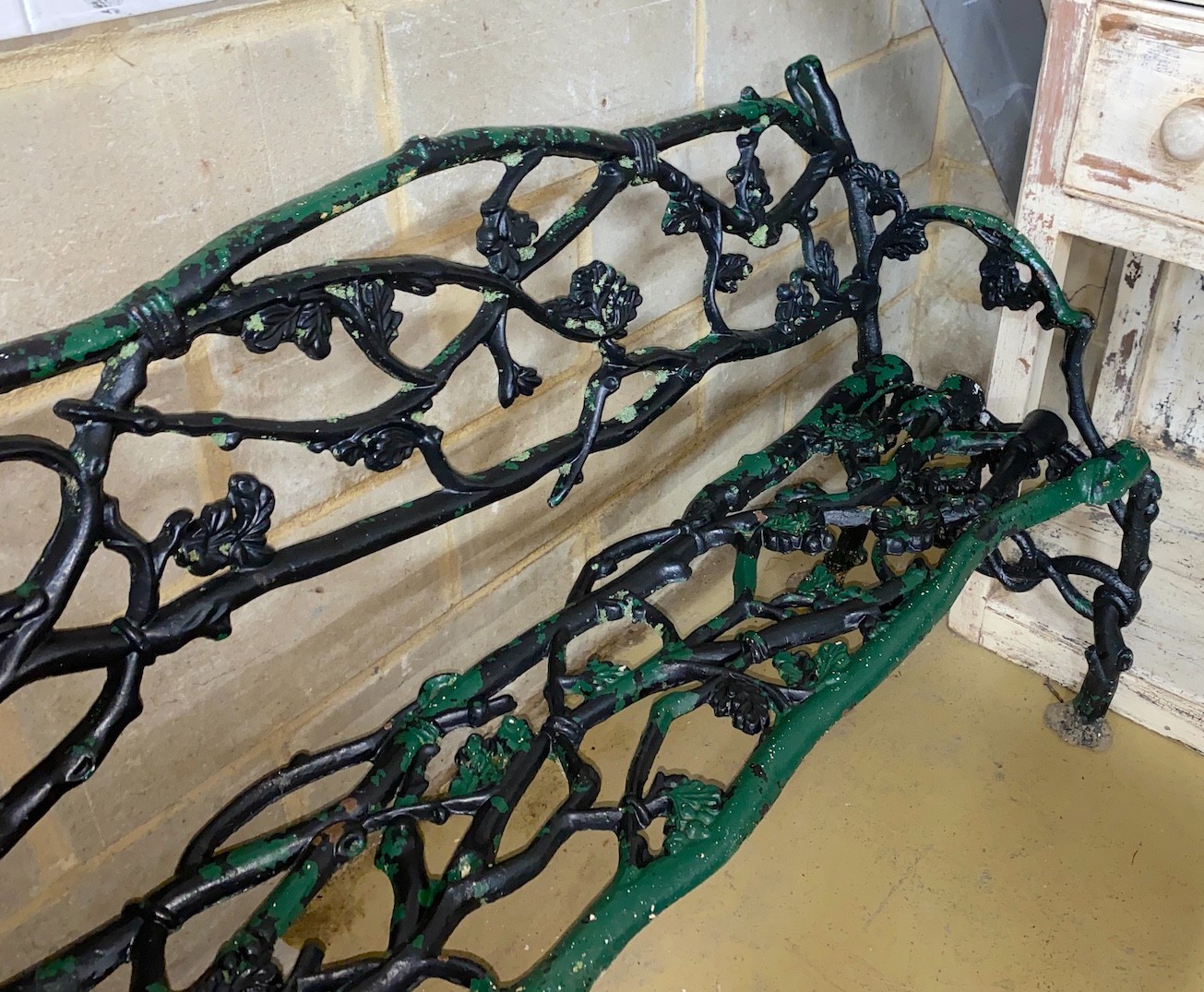 A Victorian Coalbrookdale style cast iron garden bench, length 124cm, depth 57cm, height 77cm